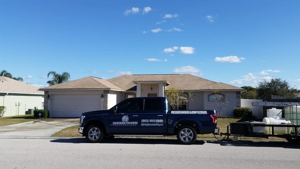 lightning presssure washing truck post roof cleaning job