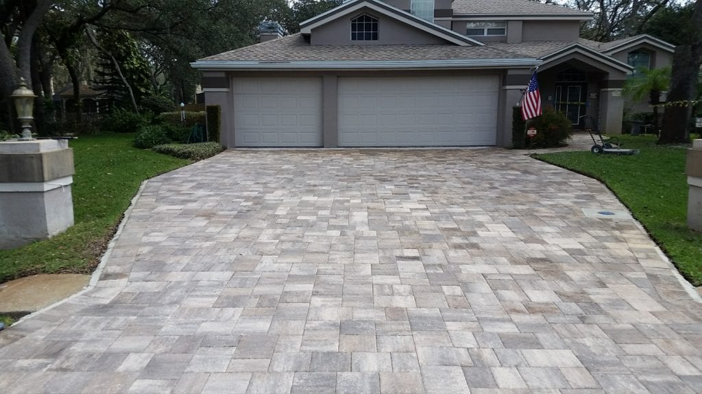 Complete Paver Sealing With the right maintenance plan in place, your pavers should last – and look beautiful – for years. Our paver sealing service is a key part of that maintenance plan. We always use a three-step process that will keep your pavers clean, attractive, and well-protected: Paver Sealing Lakeland FL Check Icon Paver Cleaning We start with a pressure washing service. This removes dirt and other imperfections. It kills mold, mildew, and moss. And it leaves your pavers looking the way you want them to: curb appeal friendly. Check Icon Paver Joint Replacement Your pavers’ joints are packed with sand. Over time, the sand can become discolored and erode – and it’s our job to replace it. We remove the old sand and swap it with material that is attractive and durable. Check Icon Paver Sealing Finally, we seal your pavers. This protective coat keeps the qualities you like about your pavers in – and keeps the elements that could hurt it out. Our team uses a high-quality sealant that offers optimal protection against stains and water damage.