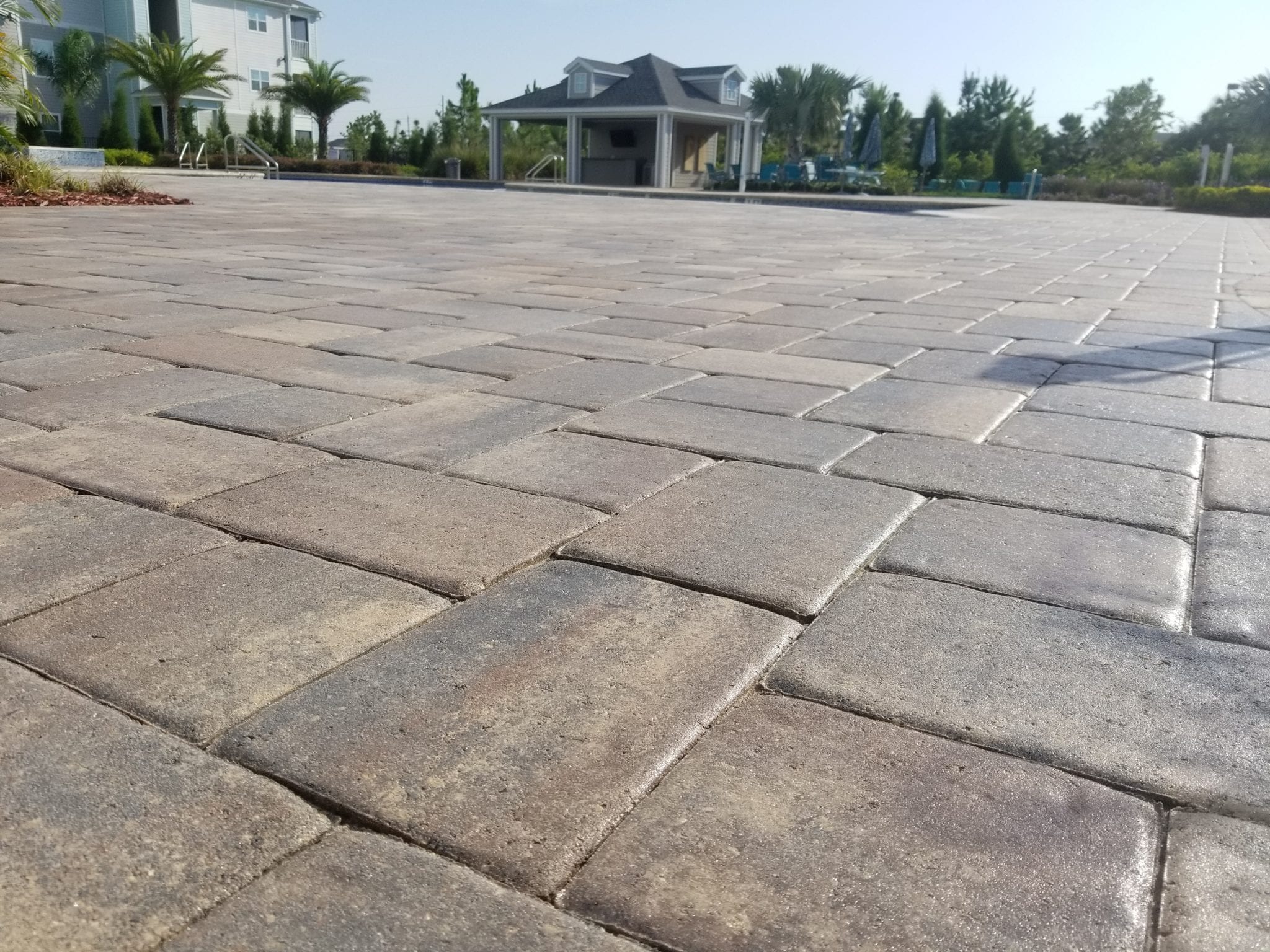 With the right maintenance plan in place, your pavers should last – and look beautiful – for years. Our paver sealing service is a key part of that maintenance plan. We always use a three-step process that will keep your pavers clean, attractive, and well-protected: