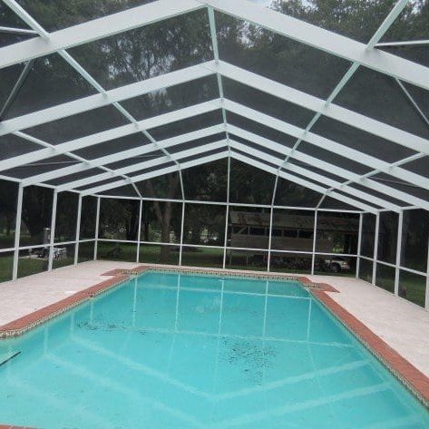 Pool deck dirty? Screen enclosure covered in green? Lightning Pressure Washing can remove the mold, mildew, and algae that has made its home in your pool cage. Pool enclosure cleaning is time consuming and it takes a gentle, low pressure approach to safely clean them.